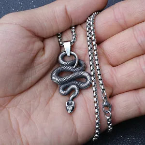 Vintage stainless steel coiled snake pendant necklace with a detailed box chain for men