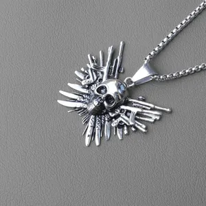 Punk style stainless steel skull necklace with miniature gun and knife weapon accents
