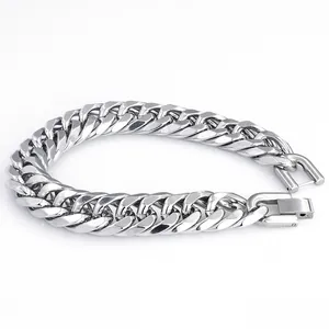 Close-up of a wide polished stainless steel curb chain bracelet with a secure clasp