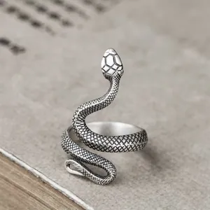Retro silver snake ring with textured scales and adjustable wrap-around punk style design