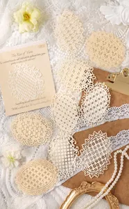 Detail of 10-piece hollow lace scrapbooking paper pack with vintage aesthetic and cutout patterns
