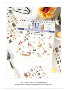 Nahaufnahme des minimalistischen Kalenders 2025 mit Monatsillustrationen und Spiralbindung