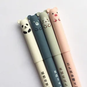 Detail of four pastel erasable pens with cute 3D panda and pig cartoon animal caps