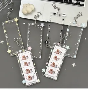 Detailed view of colorful star acrylic card holders with metal star-shaped keychains