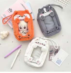Plush animal fox card pouches in orange, grey, and white with clear viewing windows