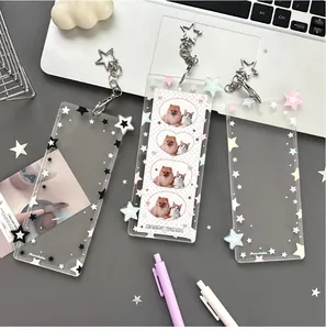Detail of colorful star acrylic photocard holders with star-shaped metal keychains