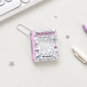 Llavero mini álbum de fotos con estampado de leopardo rosa y corazón de 6,7x5,5 cm