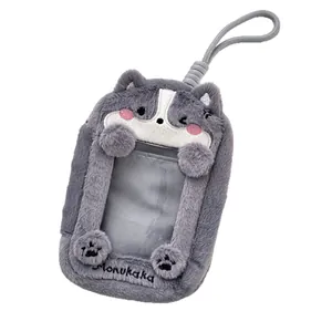 Gray plush husky animal card holder with clear window and lanyard for travel