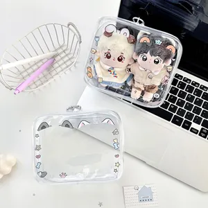 Transparent PVC animal doll carry case with cartoon prints and secure metal keychain hook