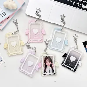 Acrylic photo card holders with angel wings and heart details in macaron colors