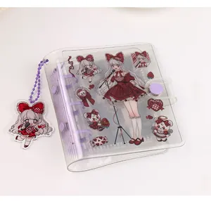Detail of transparent PVC 3-hole binder with purple snap button and cartoon bear pendant