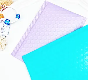 Detailed view of durable shockproof bubble mailers in light purple and teal colors