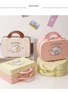 Macro view of portable cartoon puppy vanity cases in pastel colors with sturdy handles