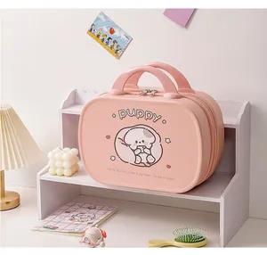 Pink portable cosmetic case with puppy cartoon pattern and sturdy carrying handle