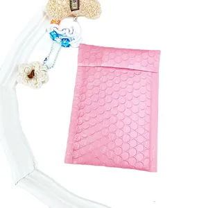 Pink bubble mailer with self-adhesive seal for jewelry and stationery shipping