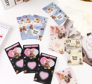 Detailed view of aesthetic Y2K cat and teddy bear sticker cards for gift packaging