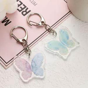 Y2K Schmetterling Acryl Schlüsselanhänger Set mit rosa und blauem Aquarell Farbverlauf