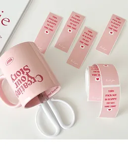 Detail of pink packaging stickers with heart and This package is happy to see you too text