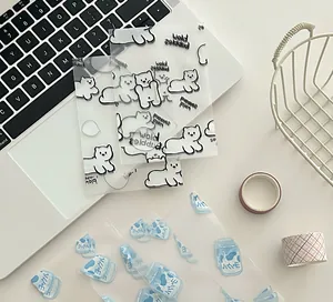 Detailed view of semi-transparent PET stickers with cartoon polar bear and drink designs