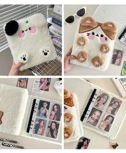 Detail of plush animal A6 binder showing furry white dog design and interior card pockets