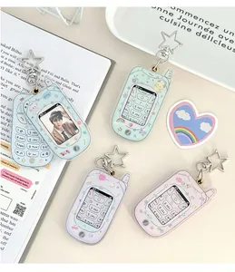 Detailed view of Y2K acrylic flip phone photo frames with star clasps and cute cartoon motifs