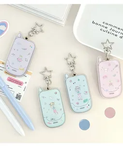 Detailed view of four Y2K-style acrylic flip phone keychains in pastel colors