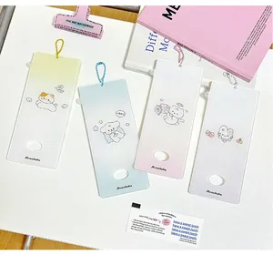 Detail of four acrylic cartoon bookmarks with cat, dog, bear designs and colorful bead chains