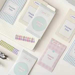 Minimalist Korean stationery set with pastel greeting cards and patterned washi tapes