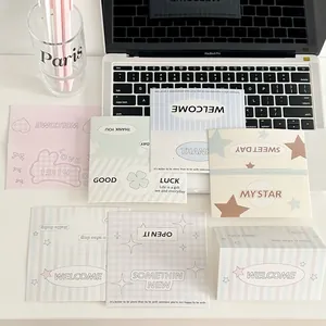 Pastel Korean style folding gift cards and envelopes on a clean minimalist desk