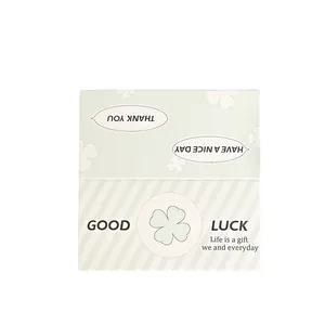 Minimalist green four-leaf clover folding gift card with Thank You and Good Luck messages