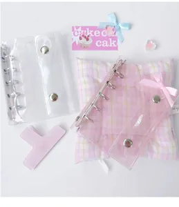 Detailed view of glitter transparent PVC 6-ring binder cover with silver snap button