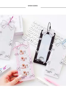 Detail of acrylic photo card holders with ballet bow motifs in three patterns