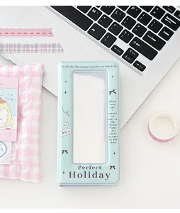 Detail of light blue photo card holder with bow motifs and a clear display window