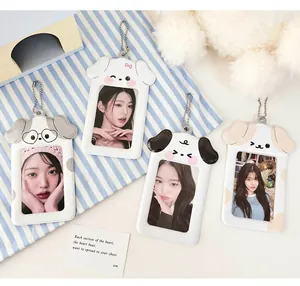 Detail of four cute puppy-shaped 3-inch PVC photocard holders with hanging bead chains
