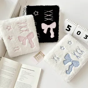 Plush ballet-style A6 photo card binder with embroidered bows and stars in black and white