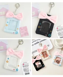 Detail view of plush photo card holders with oversized bows and star embroidery