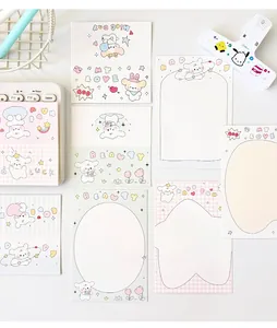 Detalle de tarjetas de cartulina de perrito animado con cuadros rosas y rayas azules