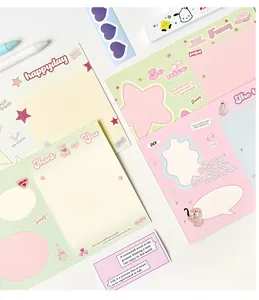 Macro detail of Y2K style bear themed folding greeting cards and gift packaging