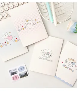Vista detallada de cuatro tarjetas de felicitación de cachorros con mensajes lindos