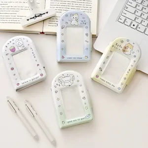 Set of four pastel cartoon photo card holders in pink, blue, yellow and green