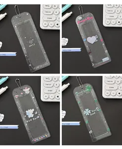 Macro shot of glittery transparent photocard holders with star and clover patterns