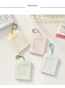 Detail showing colorful PVC card holders with metal bead chains and cute bow patterns