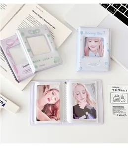 Detail van mini-fotoalbums voor 3-inch kaarten in paars, lichtblauw en groen