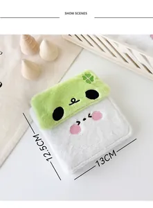 Detail view of plush cartoon dog bag with size dimensions 13cm width and 12.5cm height