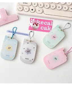 Lot de quatre porte-clés en acrylique en forme de téléphone étoile pastel