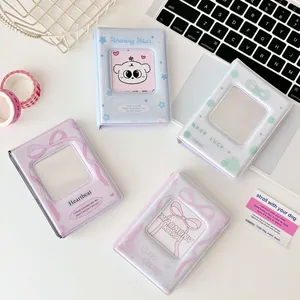 Pastelkleurige fotokaartalbums met strik en klaver voor 3-inch polaroidfoto's