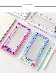Detail of colorful Y2K photocard albums with transparent star and heart PVC windows