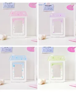 Four colors of acrylic house-shaped polaroid photo frames with decorative stands