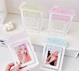 Detailed view of house-shaped acrylic photocard holders in four pastel macaron colors
