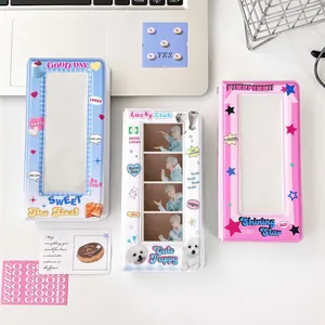 Y2K style cartoon photo card albums in pink, blue, and white for idol card storage